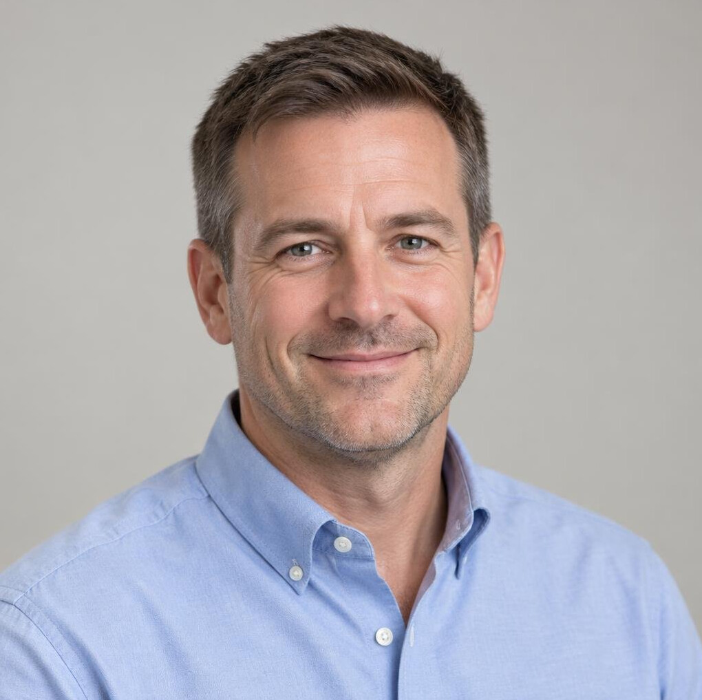 Portrait of a smiling man with short hair